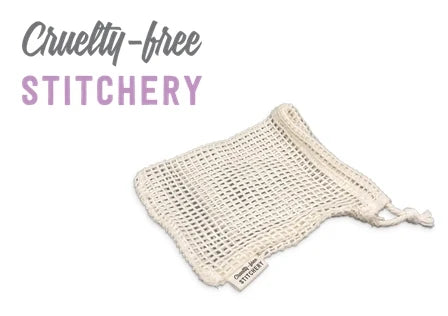 An off-white cotton soap saver drawstring bag shown on a white background with the brand 'Cruelty-free STITCHERY' in gray and pink at the top left.